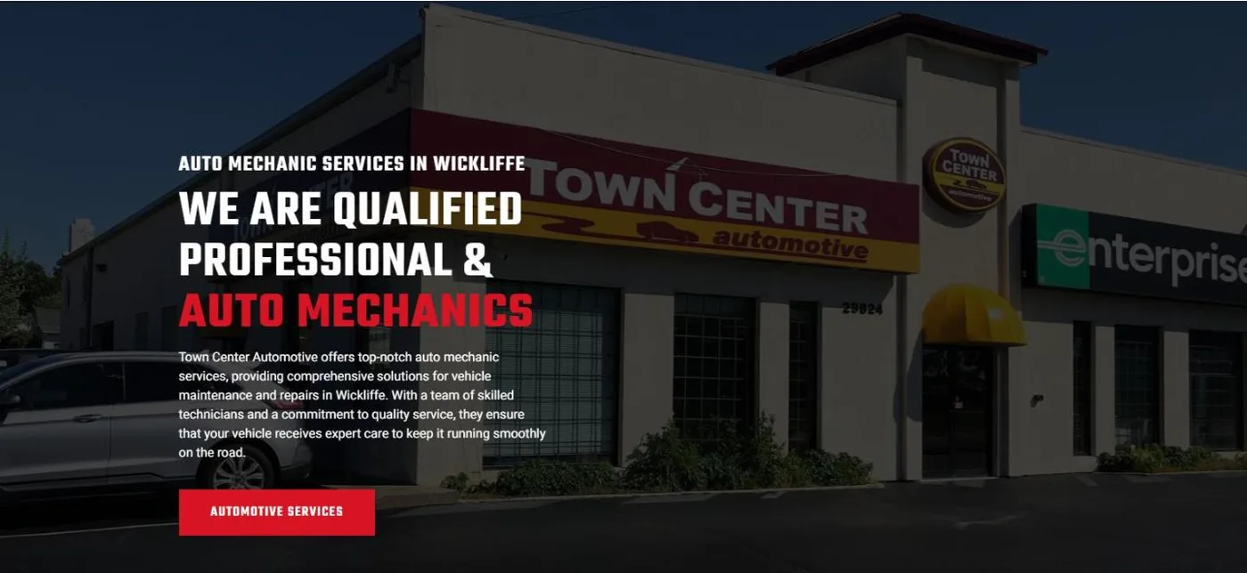 The Town Center Automotive homepage: a photo of the Town Center Automotive building in Wickliffe behind the headline We Are Qualified Professional and Auto Mechanics, with a red Automotive Services button